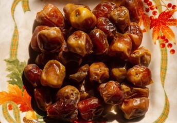 Top view of sweet sukkari dates fruit from Saudi Arabia ready for ramadan