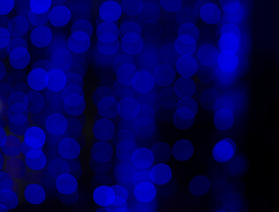 Blurred background with glowing lights. Festive mood