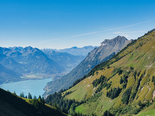 View from the Brienzer Rothorn to the Lake Brienz and the Swiss Alps on a beautiful autumn day
