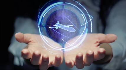 Female hands show a round conceptual hologram with military drone air weapon system. Unrecognizable woman in ashen white on a black background with future holographic technology