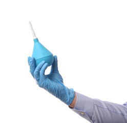 Doctor holding light blue enema on white background, closeup