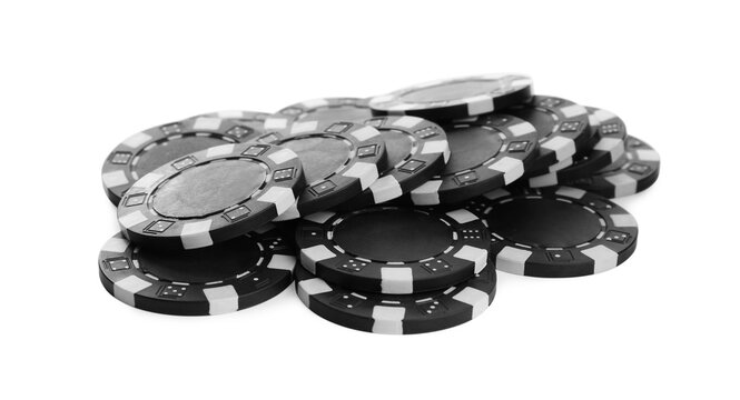 Black casino chips on white background. Poker game