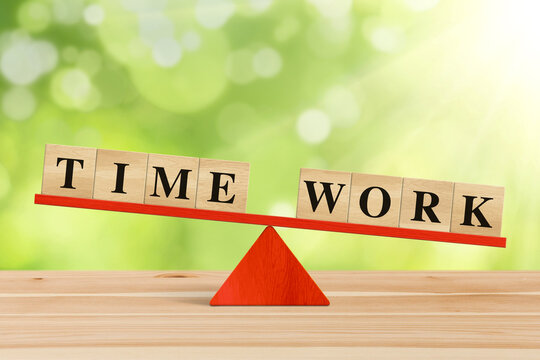 Imbalance between Work and Time on wooden seesaw.