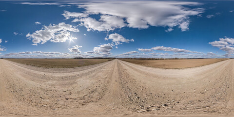 Full spherical seamless hdri panorama 360 degrees angle view on no traffic white sand gravel road...