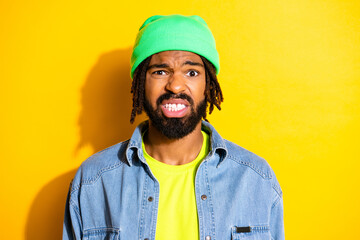 Photo of young handsome unhappy upset negative mood afro man having problems isolated on yellow color background