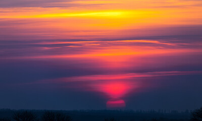 Wonderful orange sunset over the sea. Beautiful landscape.