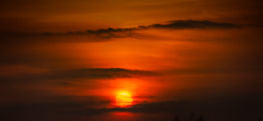 Wonderful orange sunset over the sea. Beautiful landscape.