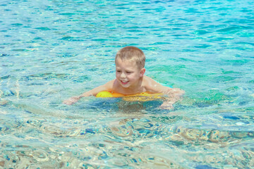 happy child playing at sea in park