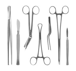 Set with different surgical instruments on white background
