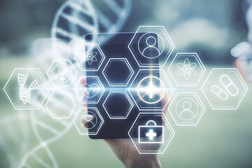 Double exposure of DNA sketch hologram and woman holding and using a mobile device. Education concept.