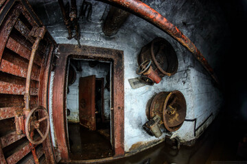 Fototapeta na wymiar sealed door in an abandoned bunker