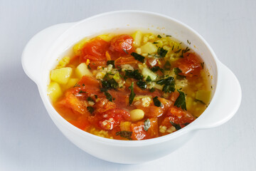 Tomato soup with beans and spices. Delicious vegetarian soup.