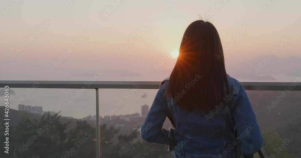 Sticker woman enjoy sunset scenery view