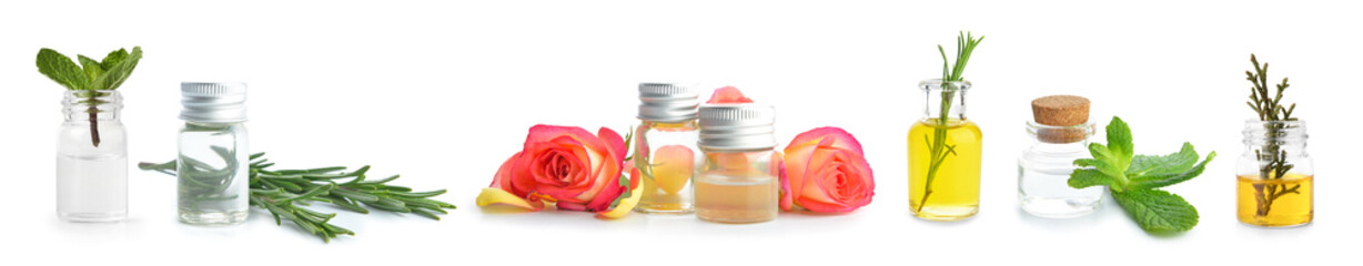 Different essential oils on white background