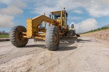 Excavator at a construction site, performing earth moving work