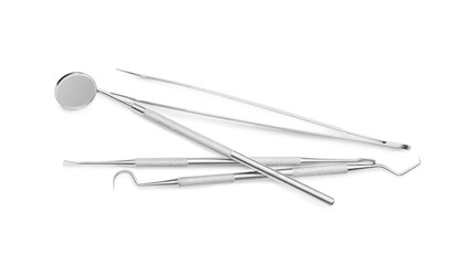 Dentist's tools on white background