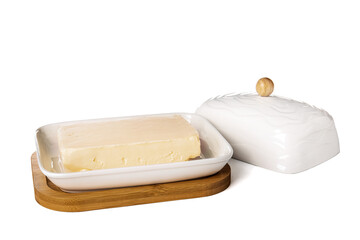 Box with fresh butter on white background