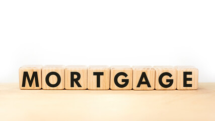 Text MORTGAGE on wooden blocks on white background