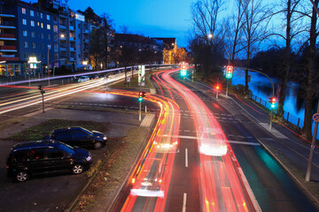 Fototapeta na wymiar BERLIN, GERMANY - DECEMBER 06, 2020: High traffic street in a rush-hour at night in Berlin