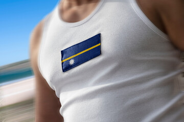 The national flag of Nauru on the athlete's chest