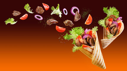 Two doner kebab or shawarma with ingredients floating in the air: beef meat, lettuce, onion,...