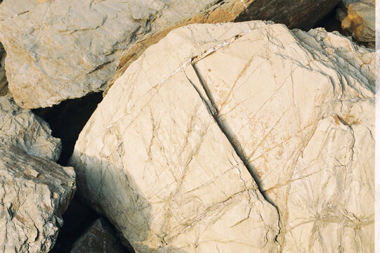 Close up of textured rocks on the beach