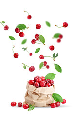 Cherry berries levitating on a white background. Isolated object on a white background.