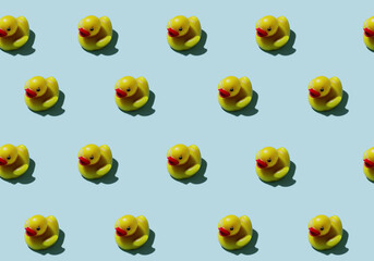 Pattern of yellow ducks on a blue background