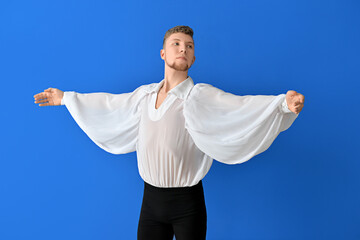 Young ballet dancer on color background