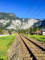 railroad tracks leading to mountain