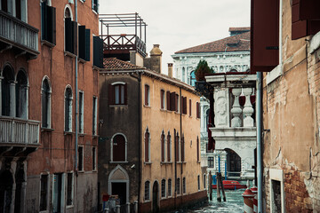 Fototapeta na wymiar View of water street and old buildings in Venice, ITALY
