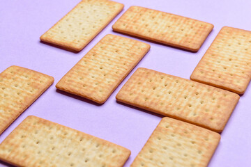 Composition with crackers on color background