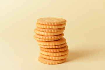 Tasty crackers on color background
