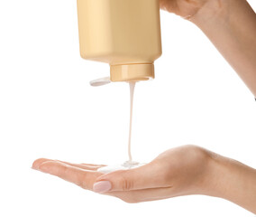 Woman pouring shower gel from bottle onto hand on white background, closeup