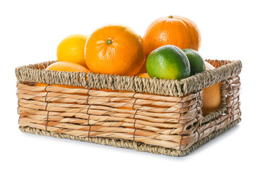 Basket with fresh citrus fruits on white background