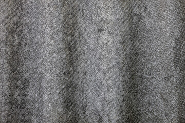 Old gray asbestos cement slate texture background close-up view