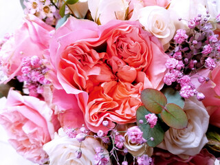 Beautiful bouquet of pink roses close-up stock images. Pink floral decoration with roses top view stock photo. Delicate pink floral background images