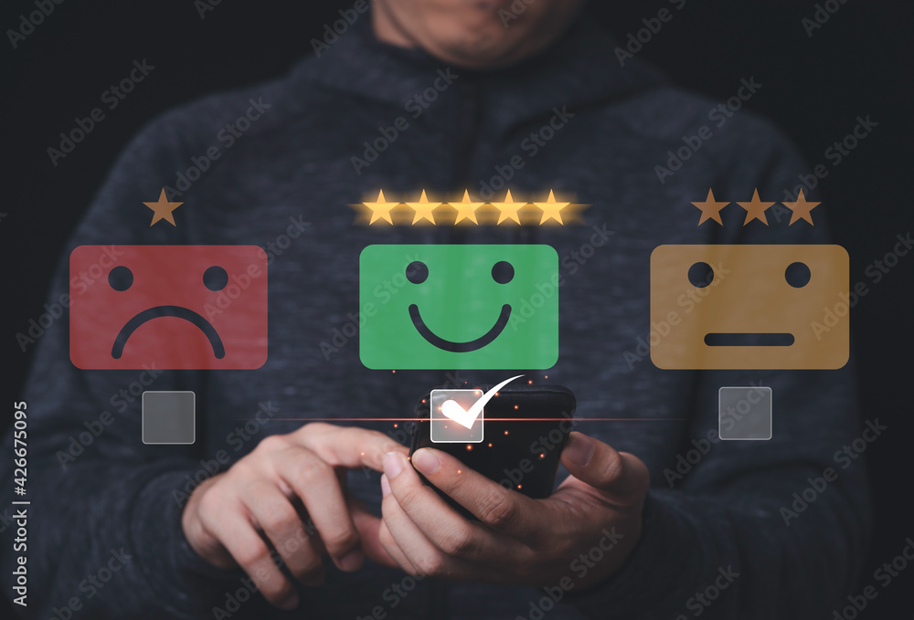 Poster businessman using mobile and touching to smiley face for customer survey product and service , custo