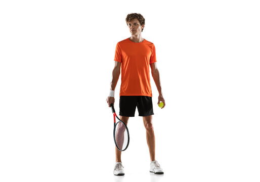 Young Caucasian man, tennis player posing isolated on white background.