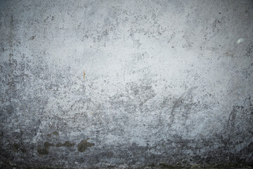 White grey old wall with shabby damaged plaster.