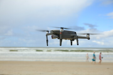 Fototapeta na wymiar Drone flying on the beach