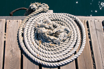 White rope beside the sea