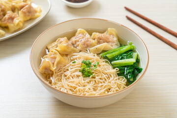 egg noodles with pork wonton soup or pork dumplings soup and vegetable