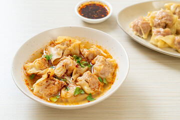 pork wonton soup or pork dumplings soup with roasted chili