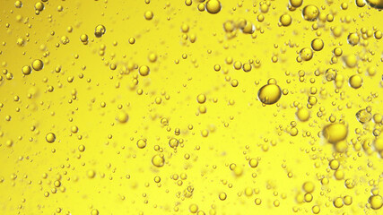 Close up of golden oil bubbles