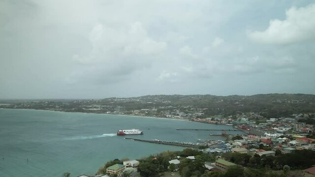 TT Spirit inter island ferry aerial slow motion view docking at the Scarborough port on the island of Tobago