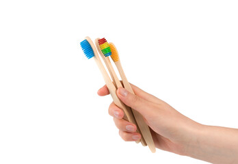 wooden eco friendly bamboo toothbrushes on a white background. Dental care conept