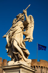 Fototapeta na wymiar Angel Sculpture of Ponte de Sant'Angelo bridge, Roma, Italy