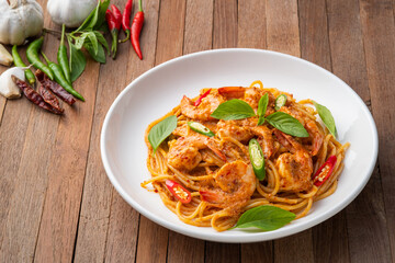 Stir-Fried Spaghetti With red curry paste and shrimp.Thai fusion food