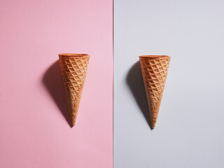 two waffle cups for ice cream on a colored background, minimalism style